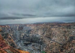 Open-pit mine. Source: Photo by Matthew de Livera on Unsplash.