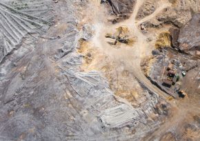 Open pit mine top view. Source: Photo by Curioso Photography on Unsplash.