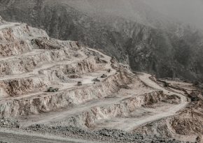 Open-pit mine top-view. Source: Photo by omid roshan on Unsplash