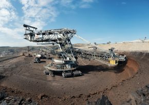 Bucket wheeler excavator at the open pit mine. Source: Photo by Albert Hyseni on Unsplash