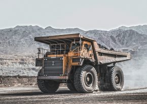 Hauling at the open-pit mine. Source: Photo by omid roshan on Unsplash